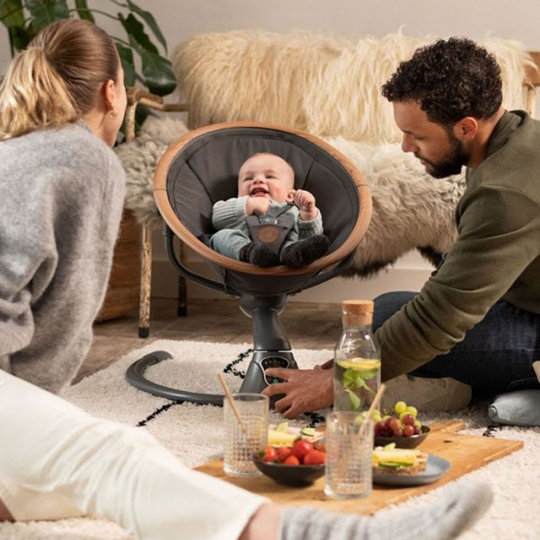 Transat bébé en acier avec jouets et un coussin de siège-repose